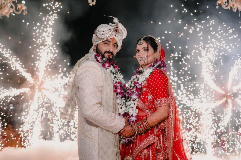 Romantic golden-hour pose or palace arch embrace