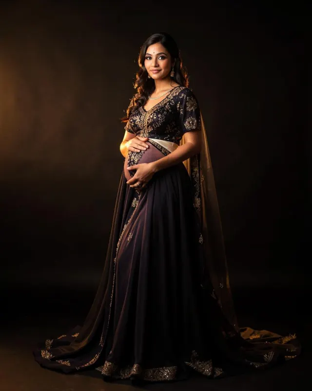 Maternity portrait in an embroidered gown